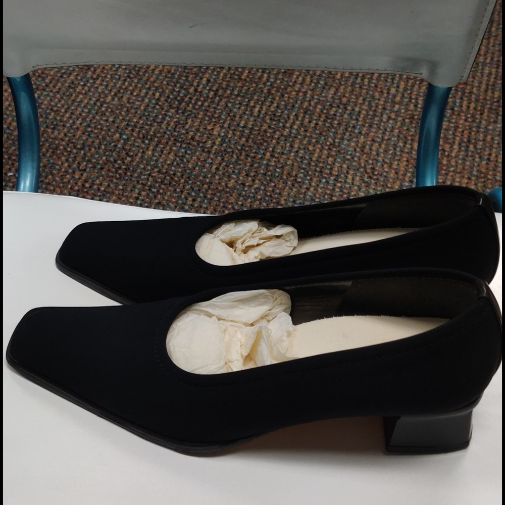 Stuart Weitzman low-heeled black dress shoes